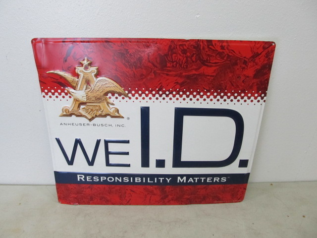 lot 111 image: Embossed Metal Budweiser WE I.D. Beer Sign