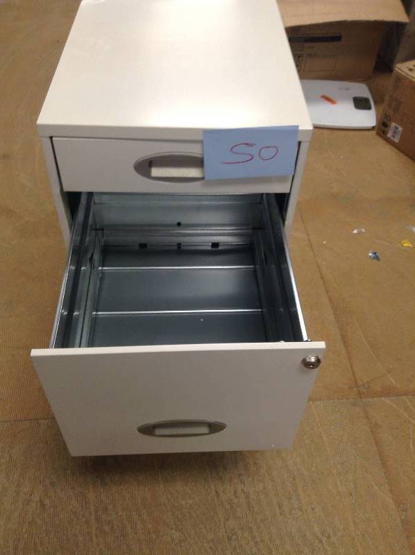 File Cabinet small dented on back corner