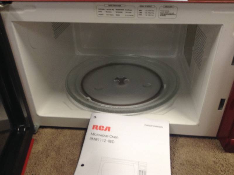 RCA Microwave Red small dent in like new condition