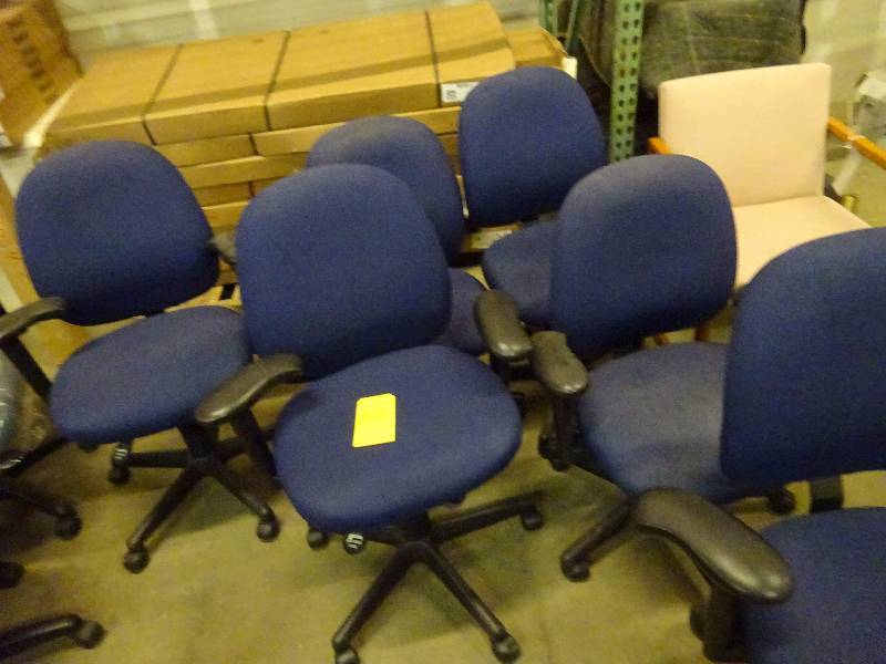 Six Blue Cloth Office Chairs