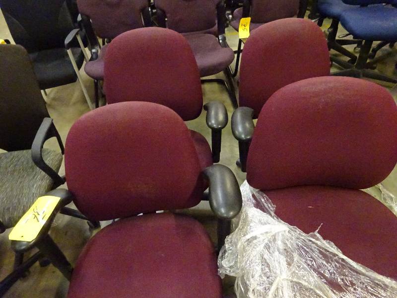 Four Maroon Cloth Office Chairs