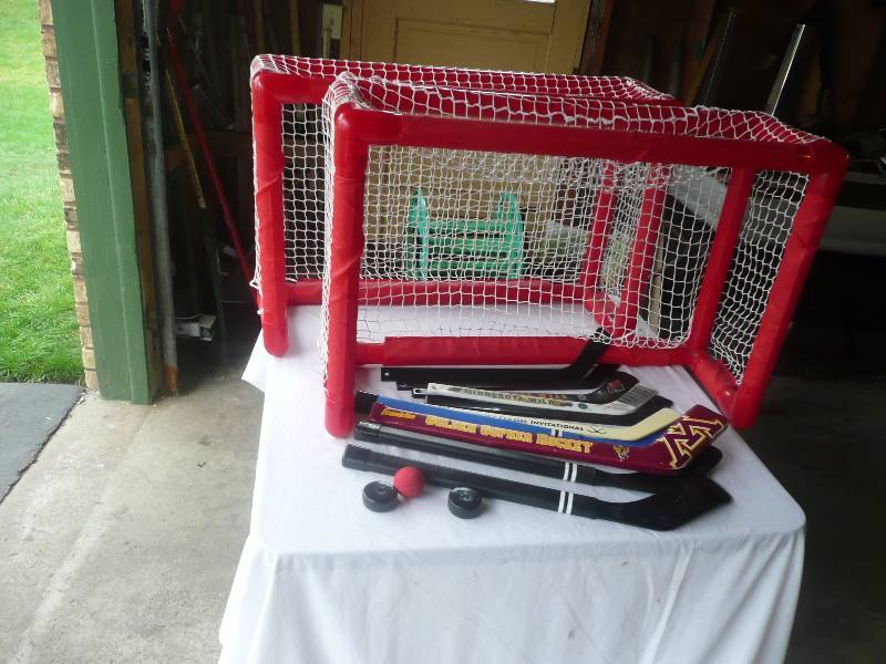 lot 58 image: Knee Hockey Nets, Sticks & Pucks With A Rock & Roller Board, Very Unique - All In Good Condition - See Pictures