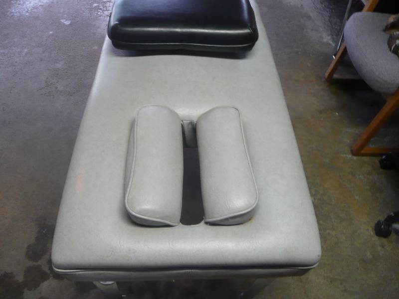 lot 60 image: Gray Professional Massage Table WBlack Leather Pillow - See Pictures