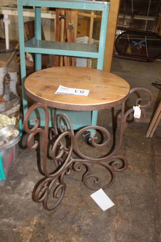 lot 83 image: Iron scroll base occasional table. Custom reclaimed wood top inlay.