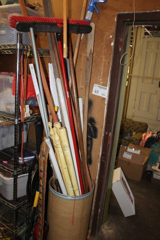 lot 48 image: Wood Poles, Brooms, Caulk Gun, Shovel