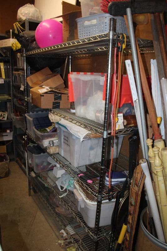 lot 49 image: Shelving Unit Contents Included China, Games, Crafts, And More