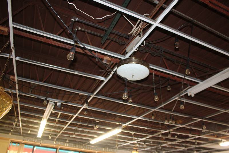 lot 202 image: Lot of (7) Industrial high quality string lights. Replaceable bulbs.