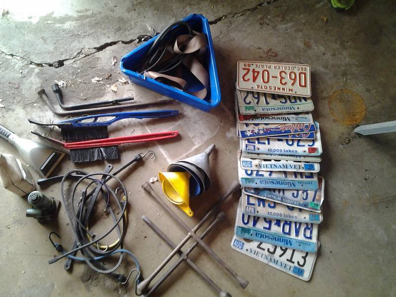 lot 25 image: Old License Plates, Tire Irons, Auto Related