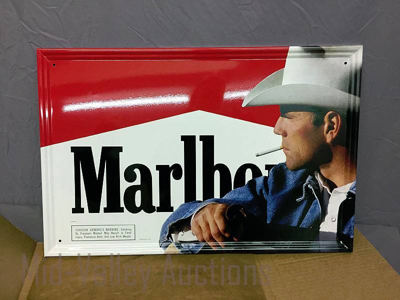lot 4 image: Marlboro Cowboy metal sign