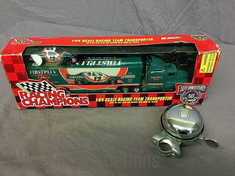lot 31 image: Toy truck & bike bell