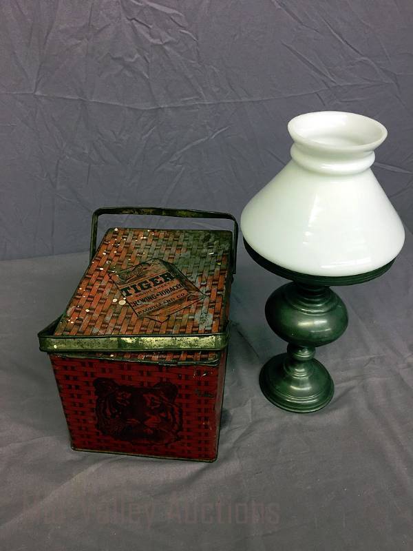 lot 33 image: Tiger Chewing Tobacco tin & gas lamp