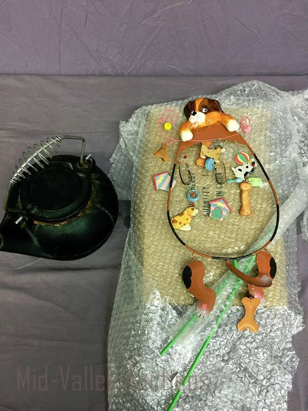 lot 35 image: Cast Iron teapot & new dog theme wind chime