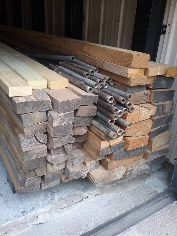 lot 122 image: Lumber - Rough Sawn Red Oak, Kiln Dried, appx 50 pieces