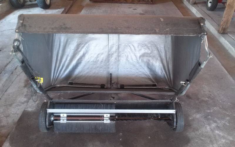 lot 7 image: Pull Behind Sweeper System