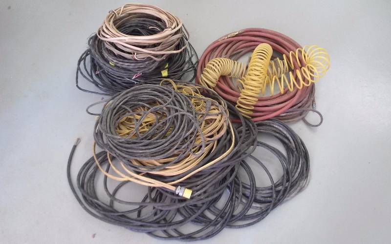 lot 45 image: Large Lot - Misc Air Hoses & Extension Cords