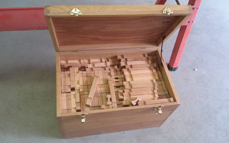 lot 100 image: Handcrafted Solid Oak Lincoln Logs in Oak Storage Box