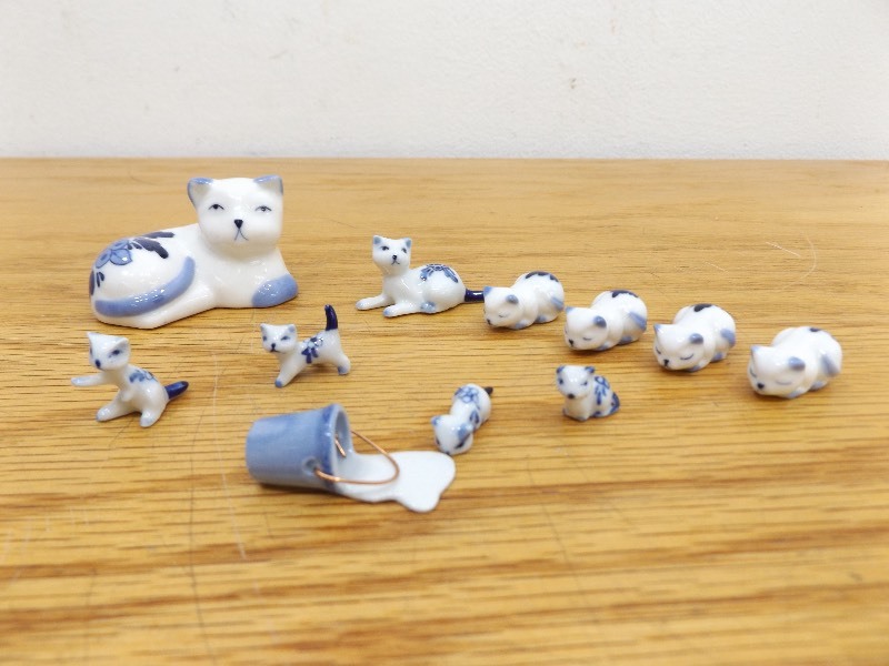 lot 11 image: Vintage Delft Blue Set of Mama Cat with Kittens and Spilt Milk