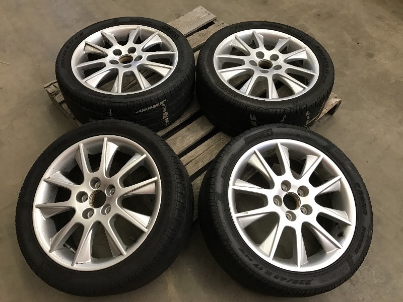 lot 93 image: Set Of (4) Saab Wheels & Tires 5-L...