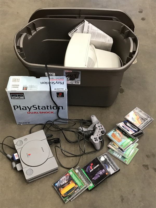 lot 45 image: Tote Of Playstation Gaming System,...
