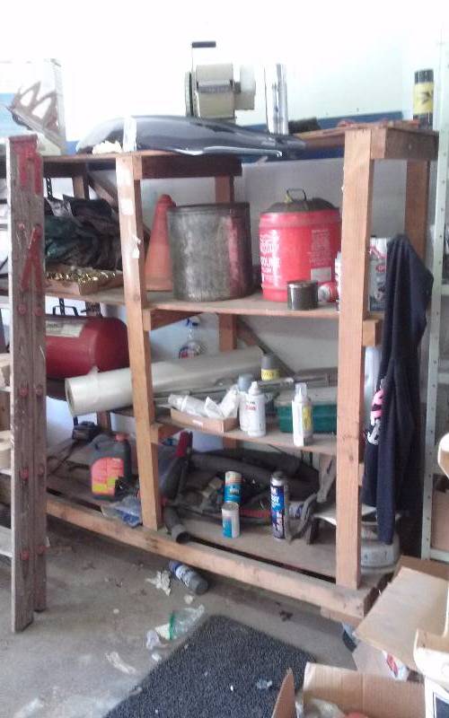 lot 9 image: Lot - Wood Ladder, Wood Rolling Cart and all content on shelf.