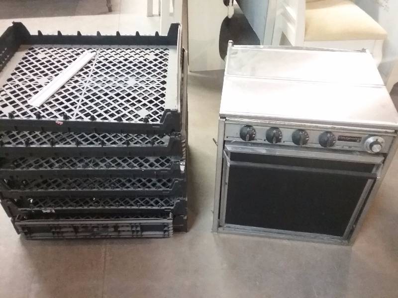 lot 77 image: Lot - Camper Stove and Plastic Bread Racks