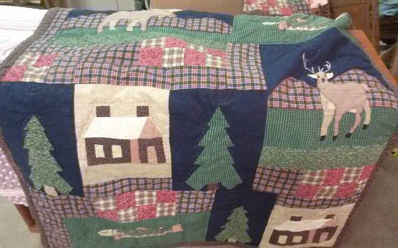 lot 26 image: Lot - Up North Throw & Quilts