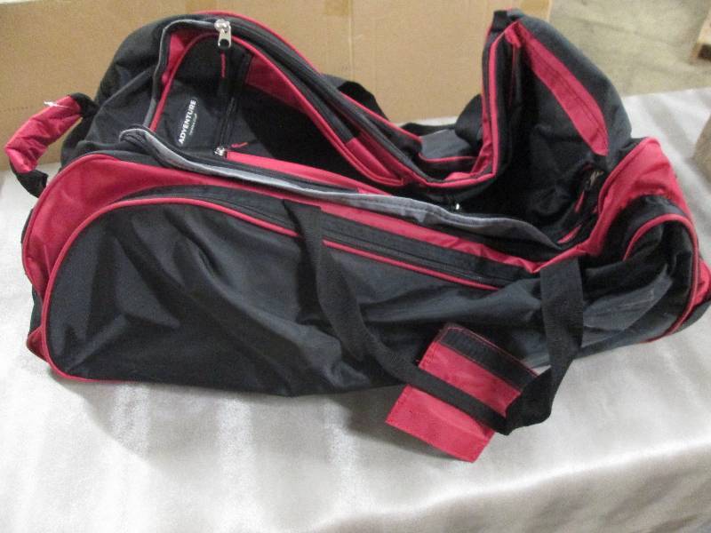 Red Expandable Rolling Duffle open ...