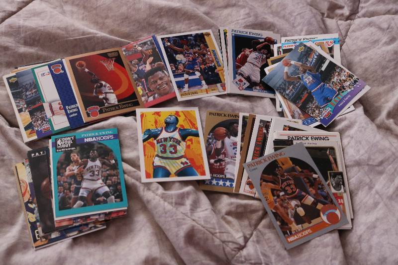 80 Patrick Ewing cards...