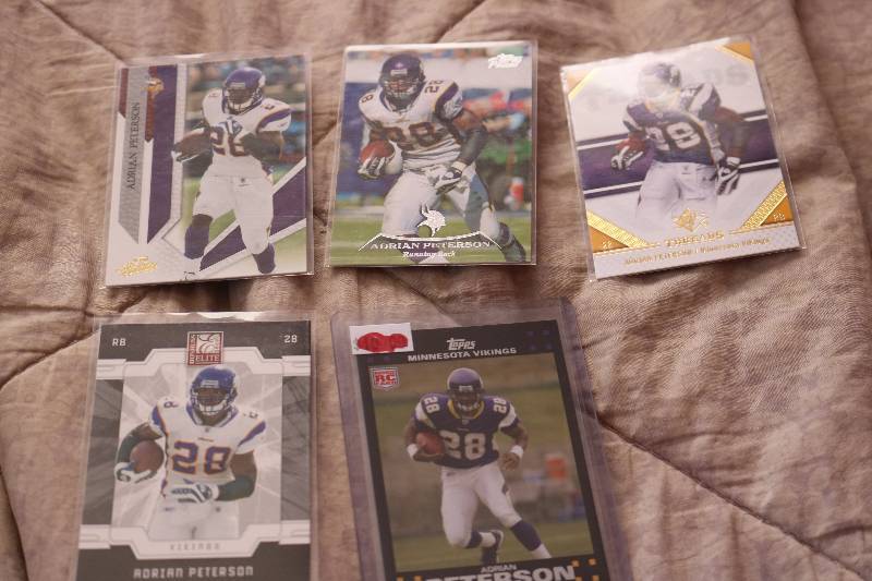 5 Adrian Peterson cards...