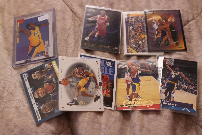 10 Kobe Bryant cards and Bryant roo...