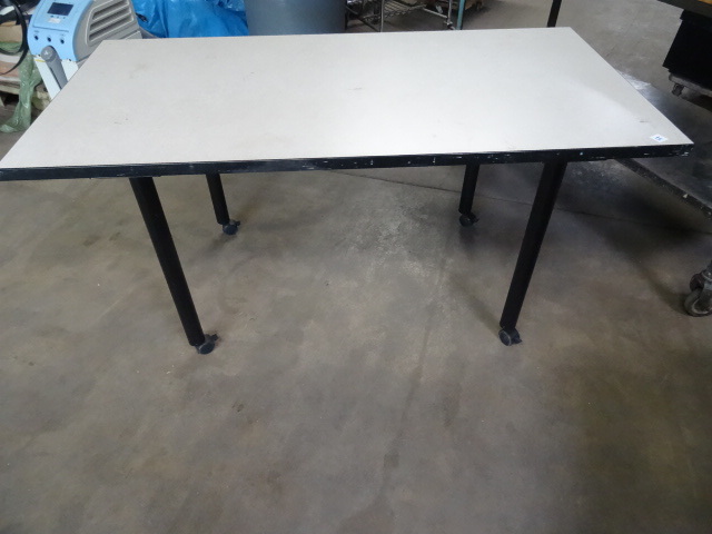 60 x 30 x 30 table on wheels....