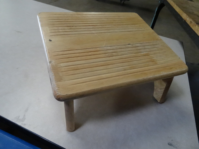 3 wood slanted foot rests...
