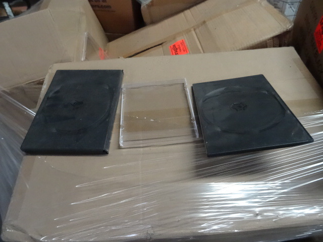 Pallet of DVD and CD cases. All dif...
