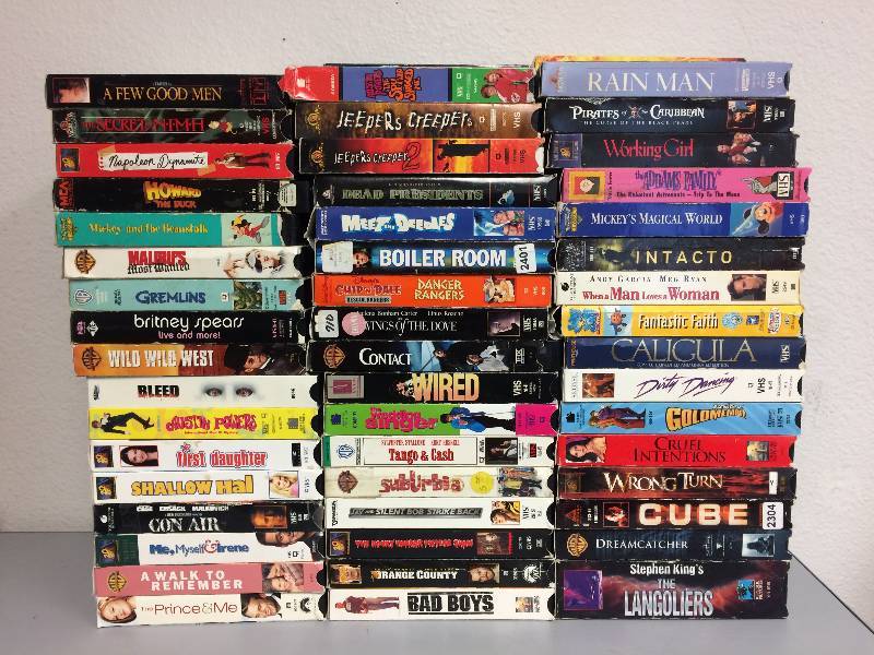 lot 12 image: 100 Assorted VHS Tapes