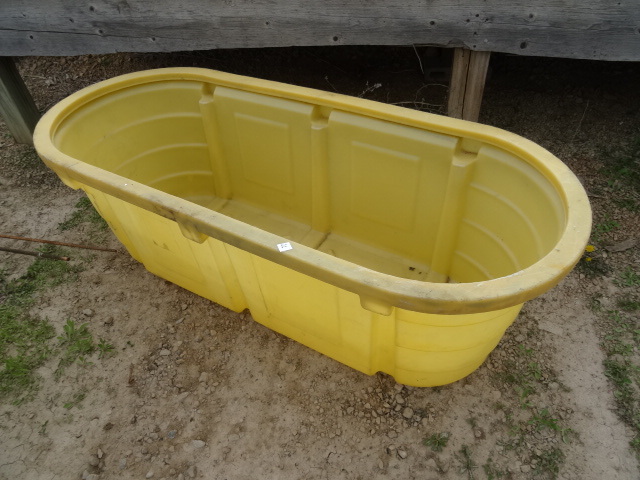 Poly water tub. 73 x 31 x 24...