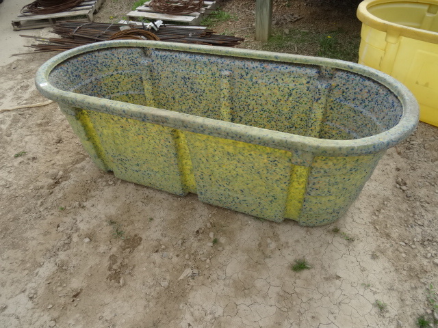 Poly water tub. 73 x 31 x 24. Has h...