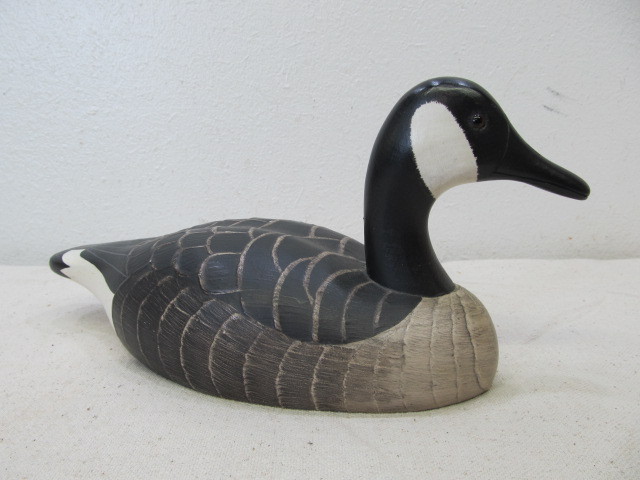lot 13 image: Carved Painted Wooden Canada Goose Decoy by Wildflower Decoys