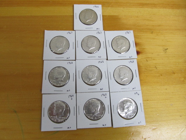lot 82 image: Group of Kennedy Half Dollars