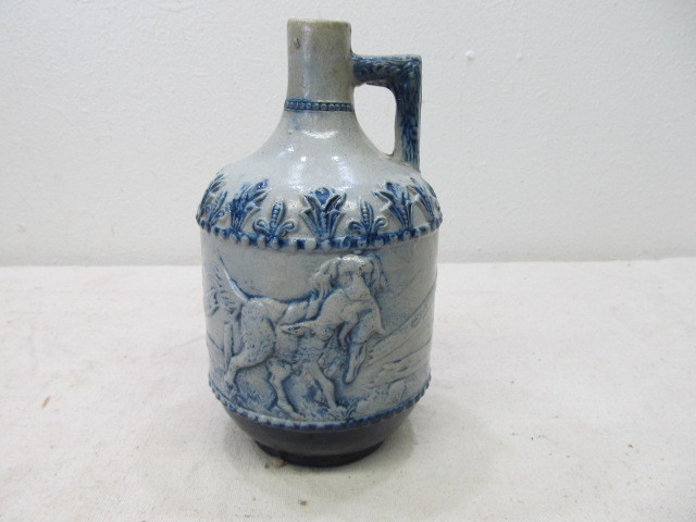 lot 4 image: Antique Whites Utica Stoneware Hunting Dog Whiskey Jug