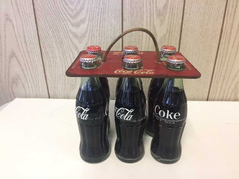 lot 5 image: Vintage Metal Coca-Cola HolderCarrier & Bottles