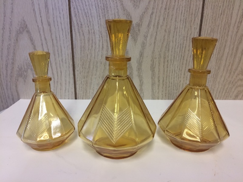 lot 28 image: 3 Amber Depression Glass Perfume Bottle