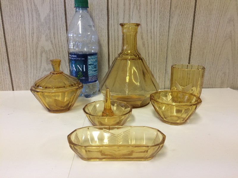 lot 29 image: Amber Depression Glass Dresser Set