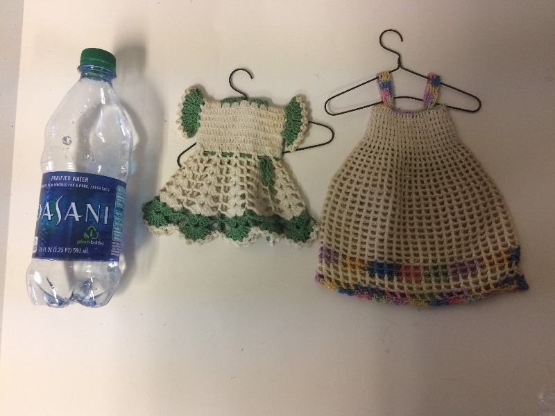 lot 31 image: 2 Crocheted Dresses on Hangers