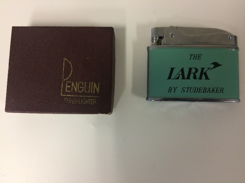 lot 66 image: Penquin The Lark by Studebaker Lighter in box
