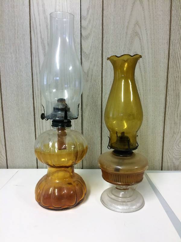lot 70 image: 2 Amber Glass Oil Hurricane Lamps