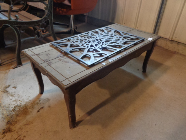 Small Table and Metal Grate