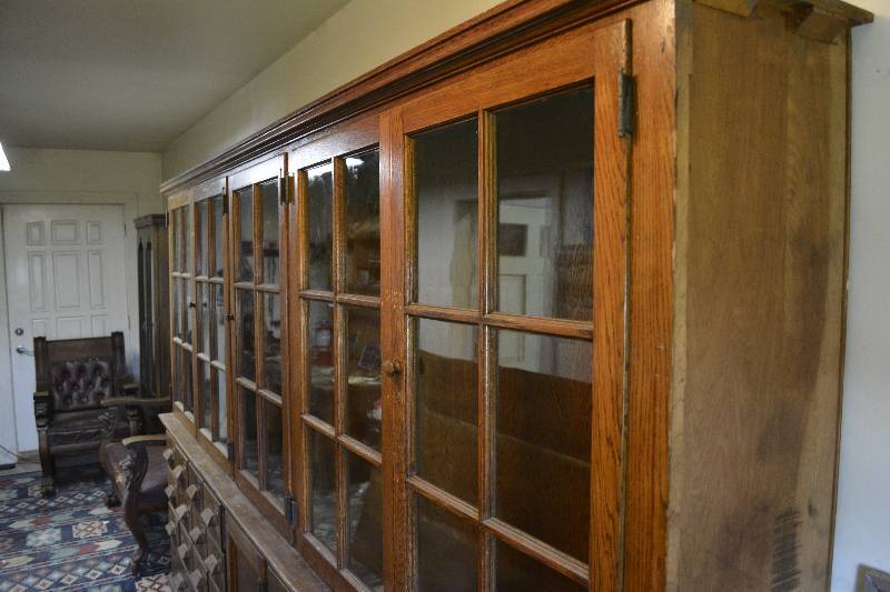 lot 20 image: Vintage Wood Cabinet from Denfeld High School