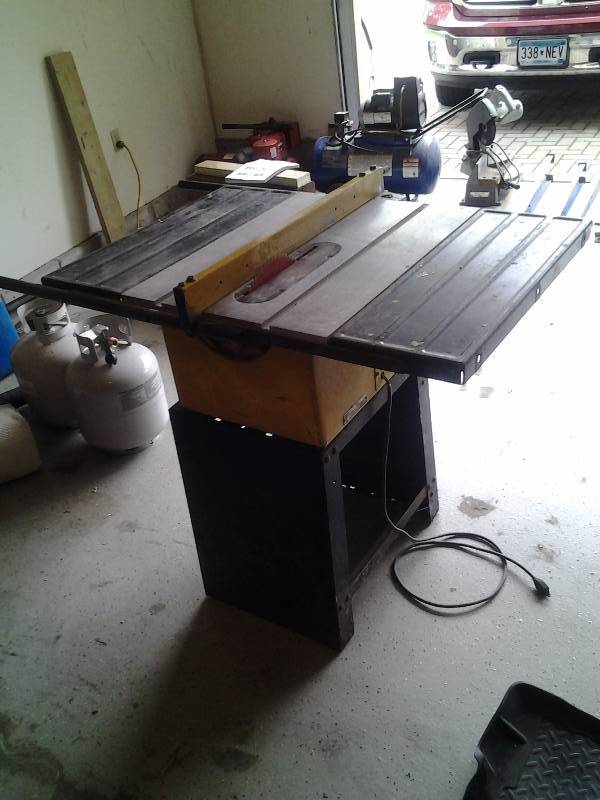 lot 5 image: Rockwell Motorized Table Saw With Stand