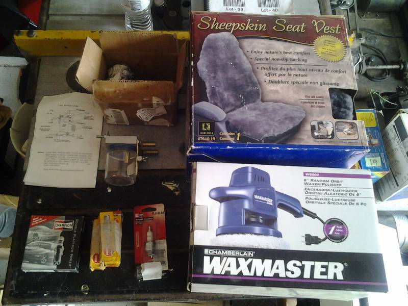 lot 40 image: Auto Related, Waxmaster, Sheep Skin Seat Cover, Fuel Saving Device