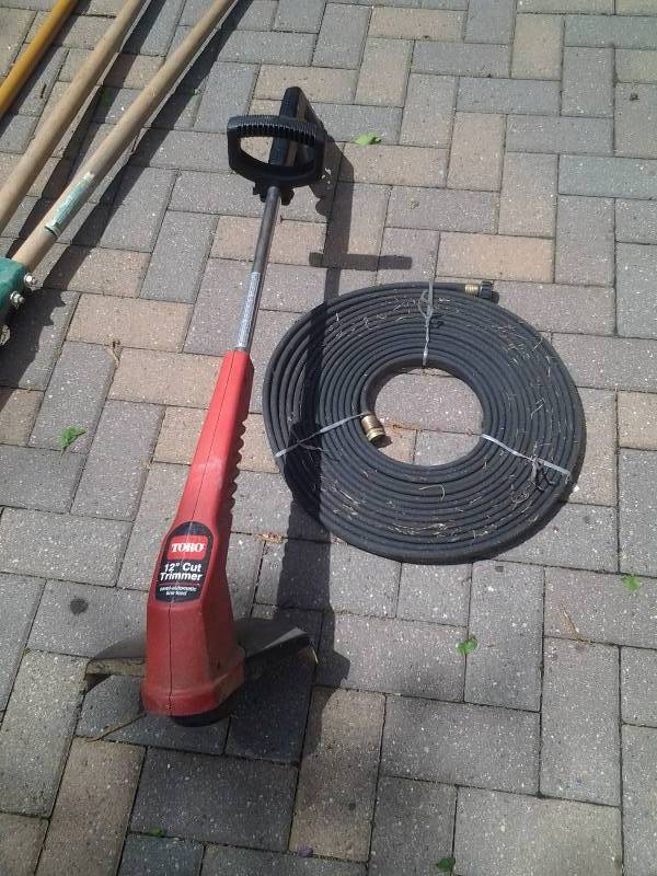 lot 48 image: Toro Electric Trimmer, Soaker Hose